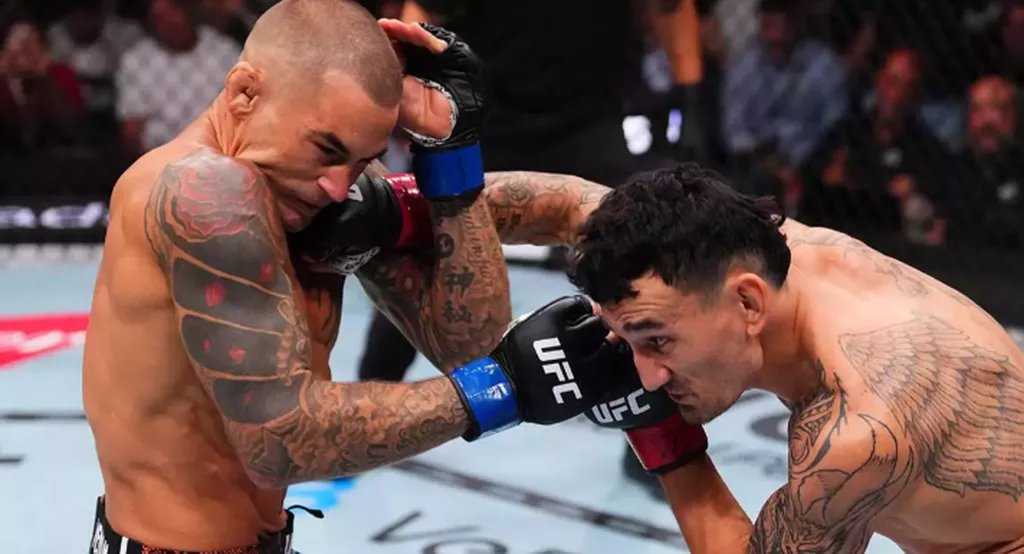 Макс Холлоуэй победил Дастина Порье в титульном бою на UFC 318