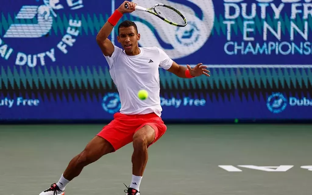 Оже-Альяссим вышел в четвертьфинал турнира ATP в Дубае, обыграв Перрикара