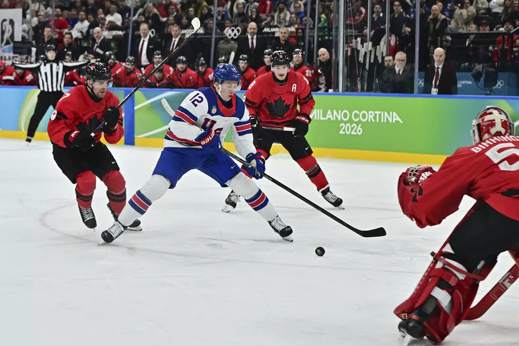 Сборная США победила Канаду в овертайме и стала олимпийским чемпионом по хоккею